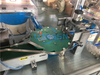 Fully automatic plastic bottle lid closures tightening cap inner parts assembly machine